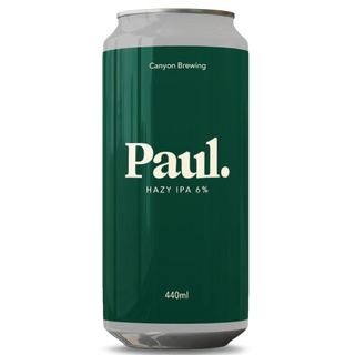 Green can of Canyon Brewing Paul Hazy IPA with white text on a white background