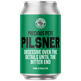 A can of DNA Brewing Precious Pete Pilsner beer with a green label, white and black text, and a graphic of a person holding a beer.
