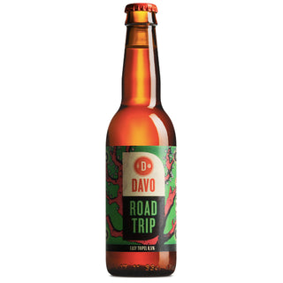 Beer bottle with a green label on a white background