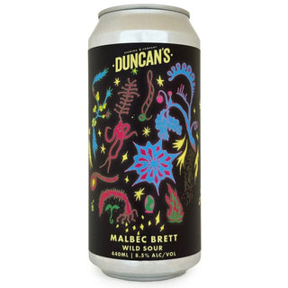 Duncan's beer can with colorful graphics on a black background