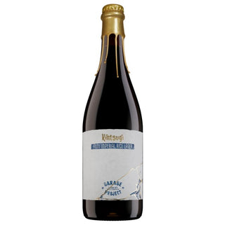 Bottle of Kintsugi Imperial Rice Lager with a gold cap on a white background