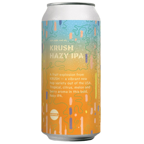 Can of Krush Hazy IPA with colorful label on a beige background