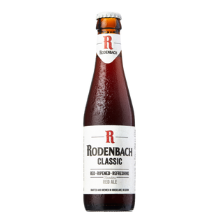 A bottle of Rodenbach Classic red-brown ale with a label that includes the brand name and 'Classic' designation, indicating it is a Flemish red-brown ale with 5.2% ABV.